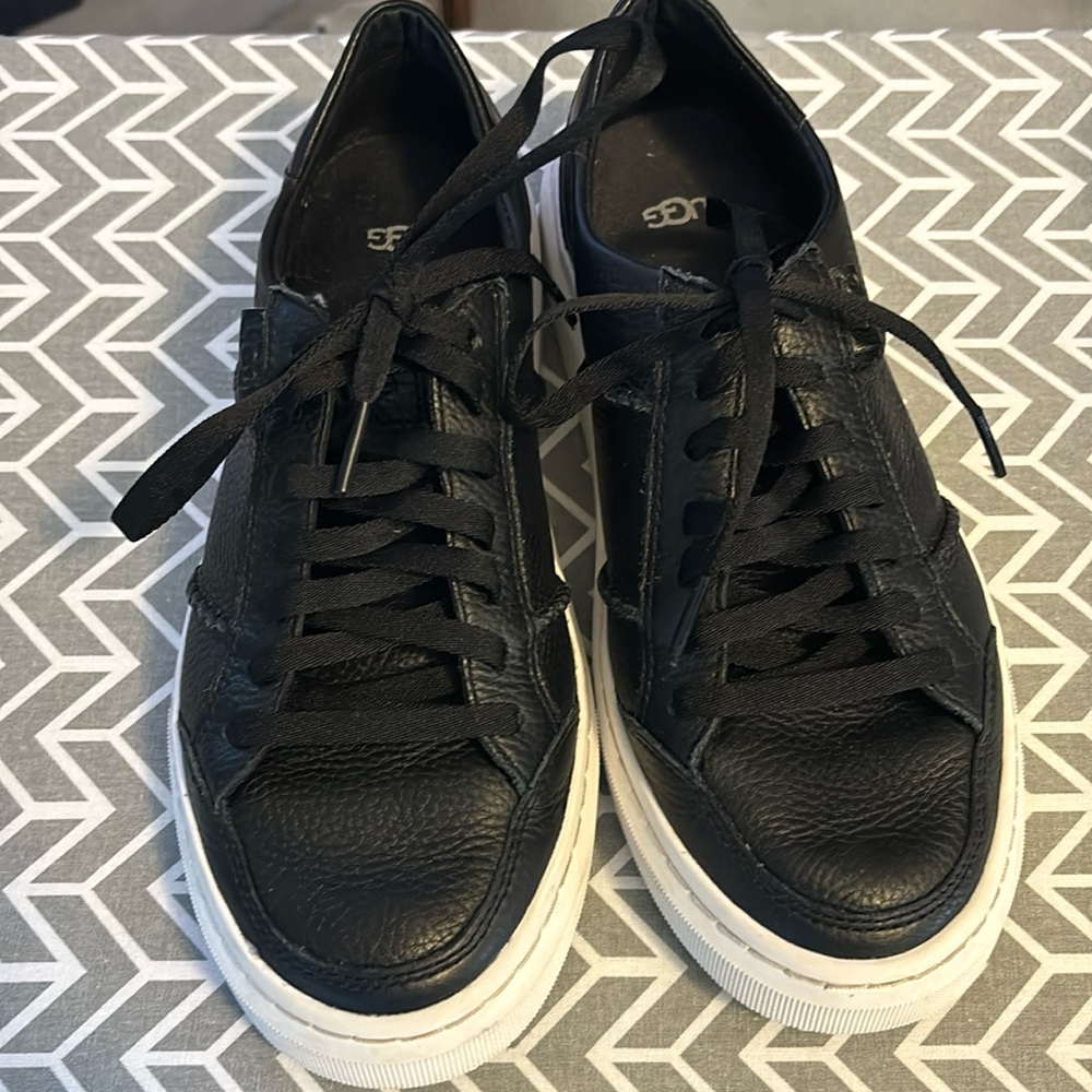 Black UGG sneakers